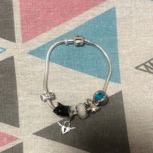 Silver Charm Bracelet with Black and Blue Accents